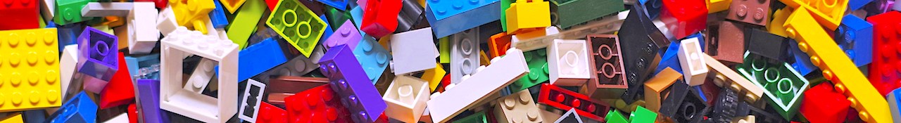 xavi-cabrera-kn-UmDZQDjM-unsplash Colorful assortment of LEGO bricks piled together in a horizontal banner image